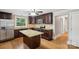 Updated kitchen featuring granite countertops, stainless steel appliances, and a convenient center island at 500 Peigler Nw St # Lots 1 & 2, Concord, NC 28027