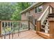 Back porch with a metal chair set offers a view of the yard and the side of the house at 507 Richards Dr, Shelby, NC 28150