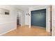 Spacious entryway features wood floors and a large closet for storage and a hall tree at 507 Richards Dr, Shelby, NC 28150