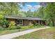 Beautiful brick home with mature landscaping and a winding walkway at 507 Richards Dr, Shelby, NC 28150