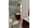 Stylish bathroom with double vanity, marble countertops, and a glass-enclosed shower at 514 N Main St, Mount Gilead, NC 27306