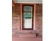 A view of a well-maintained door and frame leading into the house at 514 N Main St, Mount Gilead, NC 27306