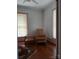 Inviting living room with comfortable seating, natural light, and wood floors at 514 N Main St, Mount Gilead, NC 27306