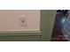 Picture of a light switch and door trim detailing the interior at 514 N Main St, Mount Gilead, NC 27306