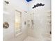 Unique bathroom features marble style shower with glass block window and multi-head shower fixtures at 5418 Commodore Pl, Clover, SC 29710