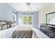 Inviting bedroom with a neutral color scheme, complemented by French doors leading to a private balcony at 5418 Commodore Pl, Clover, SC 29710
