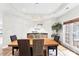 Formal dining room features a modern chandelier and large window at 5418 Commodore Pl, Clover, SC 29710