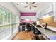 Home office with built-in shelving, desk space, and natural light at 5418 Commodore Pl, Clover, SC 29710