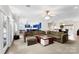 Expansive living space with open layout connecting multiple living areas, kitchen, and dining spaces at 5418 Commodore Pl, Clover, SC 29710