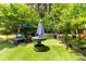 Enjoy cooking outdoors with this incredible outdoor kitchen with a grill and fireplace at 5418 Commodore Pl, Clover, SC 29710