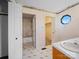 A bathroom offers a view to the shower, the commode, and the closet at 55 Dixie Dr, Taylorsville, NC 28681