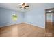 A bright and airy bedroom is decorated in a pale blue at 55 Dixie Dr, Taylorsville, NC 28681