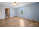 A cheerful bedroom featuring a window and a closet, offers a comfortable space to relax at 55 Dixie Dr, Taylorsville, NC 28681