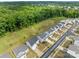 Aerial view of modern homes with landscaped yards, showcasing a peaceful residential community at 703 Pointe Andrews Dr, Concord, NC 28025