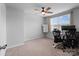 A room with plenty of natural light featuring a desk and office chairs at 703 Pointe Andrews Dr, Concord, NC 28025