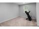 Exercise room featuring neutral carpet and walls at 703 Pointe Andrews Dr, Concord, NC 28025