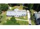 Aerial view of the home showing the roof, yard and landscaping at 7101 City View Dr, Charlotte, NC 28212
