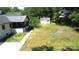 View of home's backyard, a shed, and a walkway leading to the home at 7101 City View Dr, Charlotte, NC 28212