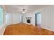 Bright living room with hardwood floors, fireplace, and neutral wall colors for cozy appeal at 7101 City View Dr, Charlotte, NC 28212