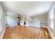 Spacious living room with hardwood floors and neutral paint, offering a versatile space at 7101 City View Dr, Charlotte, NC 28212