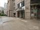 A 7-Eleven store front with clear signage and easy access from the building at 718 W Trade St, Charlotte, NC 28202