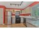 Modern kitchen with stainless steel appliances and stone countertops at 7312 Barcliff Dr, Charlotte, NC 28212