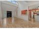 Open-concept living area with hardwood floors, high ceilings and modern lighting at 7312 Barcliff Dr, Charlotte, NC 28212