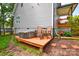 Backyard deck with hot tub and chairs at 8024 Eagle St, Mount Pleasant, NC 28124