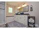 Bathroom features a double sink vanity, neutral paint, and modern fixtures at 8024 Eagle St, Mount Pleasant, NC 28124