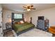 Spacious main bedroom with a ceiling fan, neutral walls, an area rug, and ample natural light at 8024 Eagle St, Mount Pleasant, NC 28124