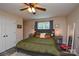 Spacious main bedroom with a ceiling fan, neutral walls, and ample natural light at 8024 Eagle St, Mount Pleasant, NC 28124