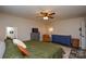Spacious main bedroom with a ceiling fan, neutral walls, area rug, and furnishings at 8024 Eagle St, Mount Pleasant, NC 28124