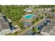 Aerial shot of the community pool with a pool house and lounge seating at 8031 Scarlet Oak Ter, Indian Land, SC 29707