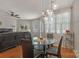 Charming dining area features modern lighting fixture and access to the outside at 8031 Scarlet Oak Ter, Indian Land, SC 29707