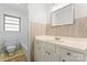 Bright bathroom featuring a vanity and mirror at 804 Gw Broome Rd, Monroe, NC 28112