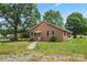 Charming single-story brick home with a well-manicured lawn and inviting front porch at 804 Gw Broome Rd, Monroe, NC 28112