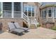 Backyard featuring brick patio, outdoor seating, grill, and manicured lawn, perfect for outdoor enjoyment at 8701 Highgrove St, Charlotte, NC 28277