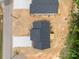 High angle aerial view of two homes with black roofs and wooden decks in a residential area at 894 Oval St, Kannapolis, NC 28081