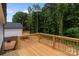 Elevated wooden backyard deck overlooking a lush green space at 894 Oval St, Kannapolis, NC 28081