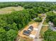 Scenic aerial view of new construction homes nestled in a vibrant, wooded area at 896 Oval St, Kannapolis, NC 28081