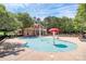 Community pool with a mushroom fountain and lounge chairs for relaxing at 9157 Snow Hill Ct, Charlotte, NC 28269