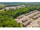 Aerial view of a lovely residential neighborhood with lush greenery and well-maintained streets at 9203 Grand Valley Dr, Charlotte, NC 28213