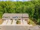Overhead shot of lovely townhomes with driveways and grassy areas on a sunny day at 9203 Grand Valley Dr, Charlotte, NC 28213