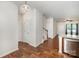 Bright entryway featuring hardwood floors, staircase, and provides access to the main living areas at 9203 Grand Valley Dr, Charlotte, NC 28213