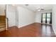Inviting living room featuring hardwood floors, natural light, and neutral paint at 9203 Grand Valley Dr, Charlotte, NC 28213