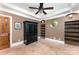 Cozy bedroom with a unique round window, built-in shelves, and a tray ceiling at 1139 S Belvedere Ave, Gastonia, NC 28054