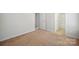 Spacious bedroom features neutral walls, plush carpet, and ample natural light at 11530 Galashiels Dr, Huntersville, NC 28078