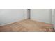 Bedroom featuring neutral carpet, white walls and trim, and a door to the hallway at 11530 Galashiels Dr, Huntersville, NC 28078