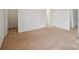 Bedroom with neutral walls, plush carpet, and ample closet space at 11530 Galashiels Dr, Huntersville, NC 28078
