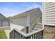 Exterior garage with siding, stairs and railings leading to an entrance at 11530 Galashiels Dr, Huntersville, NC 28078